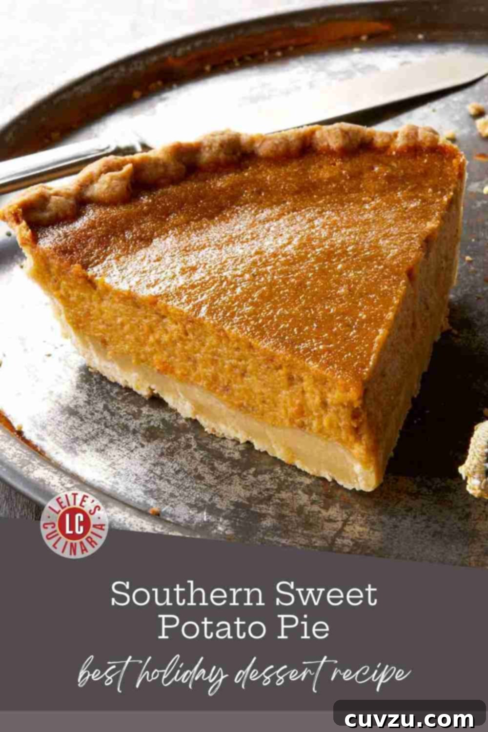 Velvet Southern Sweet Potato Pie 3 A perfectly sliced Southern sweet potato pie on a white dessert plate, revealing its creamy, smooth filling and a golden, flaky brown sugar crust.