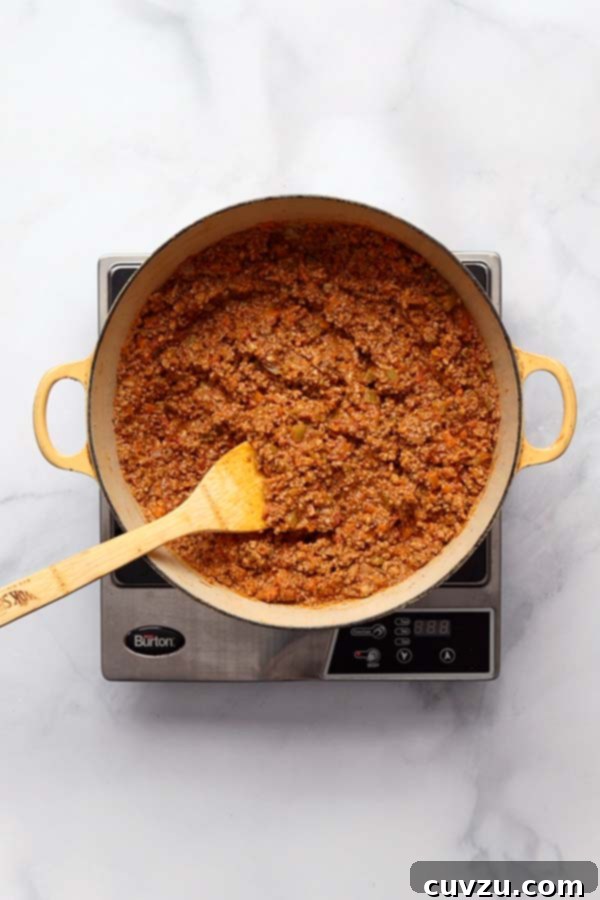 Marcella Hazan's Classic Bolognese 13 he Bolognese sauce gently simmering uncovered in a Dutch oven, reducing and thickening.