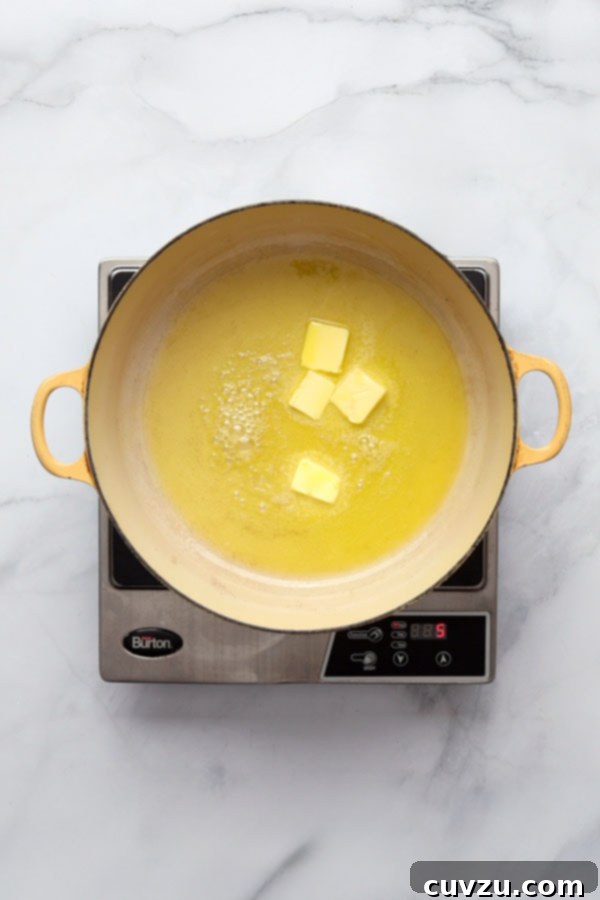 Marcella Hazan's Classic Bolognese 6 Olive oil and butter heating in a Dutch oven.