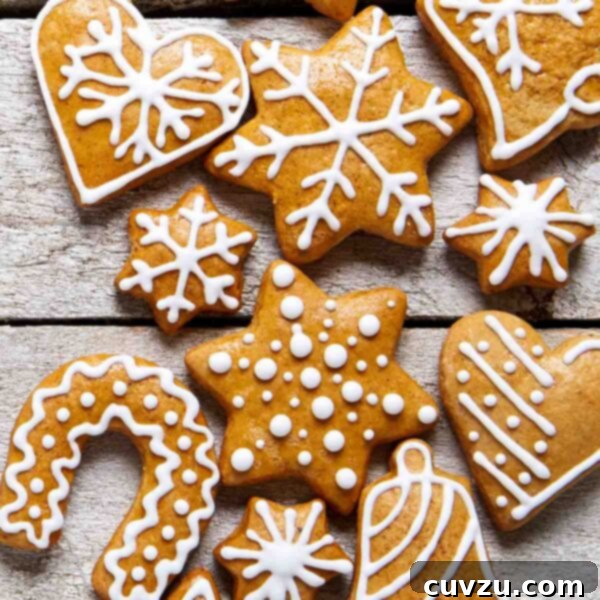 Zesty Molasses Gingersnaps 3 A variety of iced gingersnaps cookies cut into different shapes.