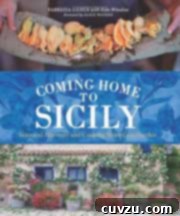 Coming Home To Sicily cookbook cover, featuring a scenic view of a Sicilian landscape.