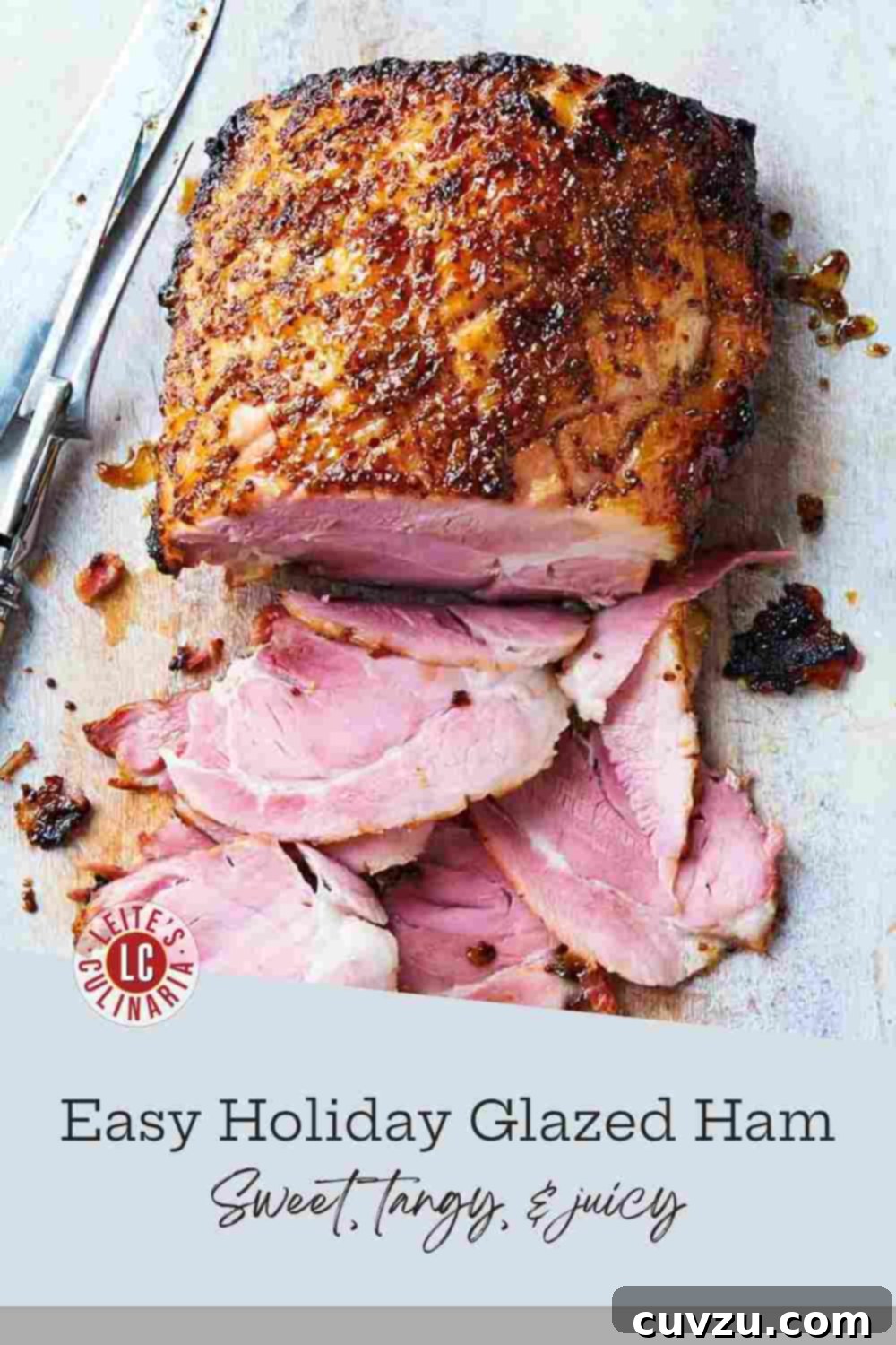 Irresistible Honey Glazed Ham 3 Baked boneless ham with a sticky brown sugar and orange marmalade glaze, beautifully sliced for serving on a white-washed board.