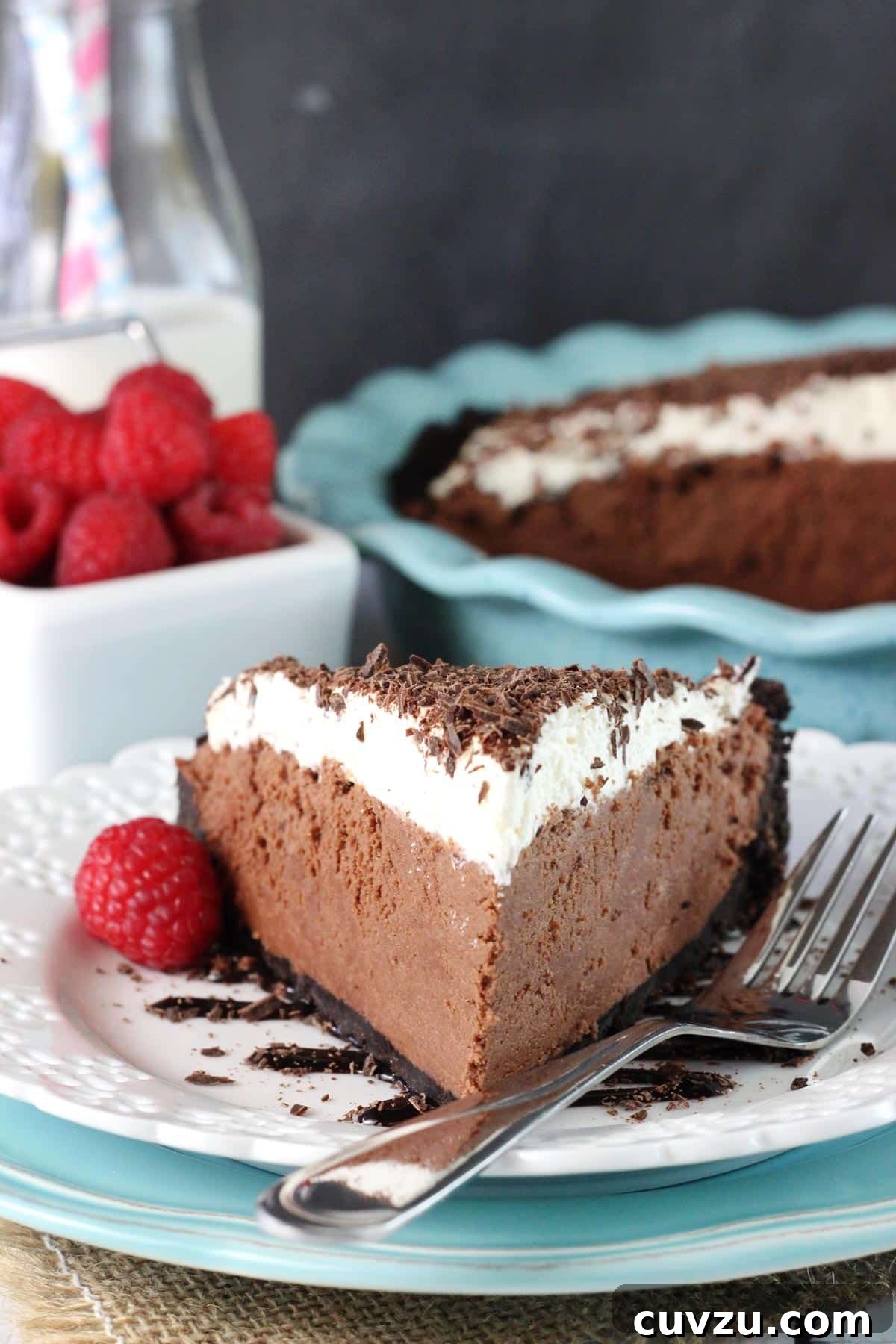 Decadent Chocolate Truffle Pie 4 A slice of chocolate truffle pie on a white plate.