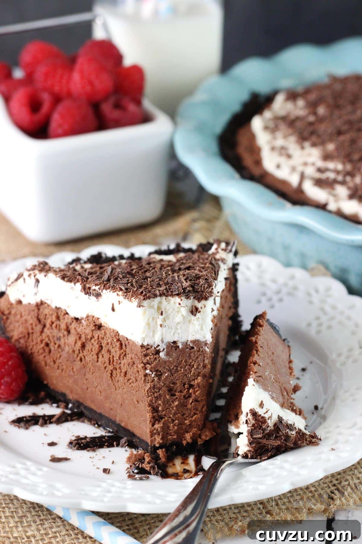 Decadent Chocolate Truffle Pie 7 A slice of chocolate truffle pie with a bite removed on a fork.