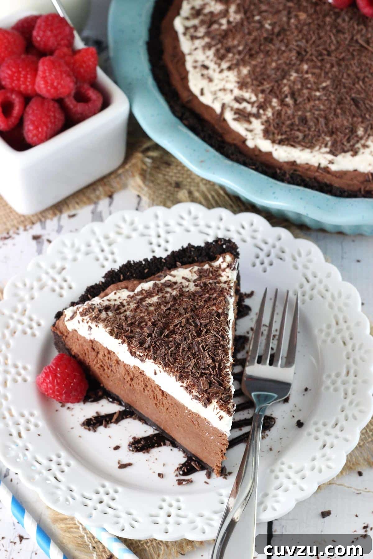 Decadent Chocolate Truffle Pie 8 A slice of chocolate truffle pie on a white dessert plate.