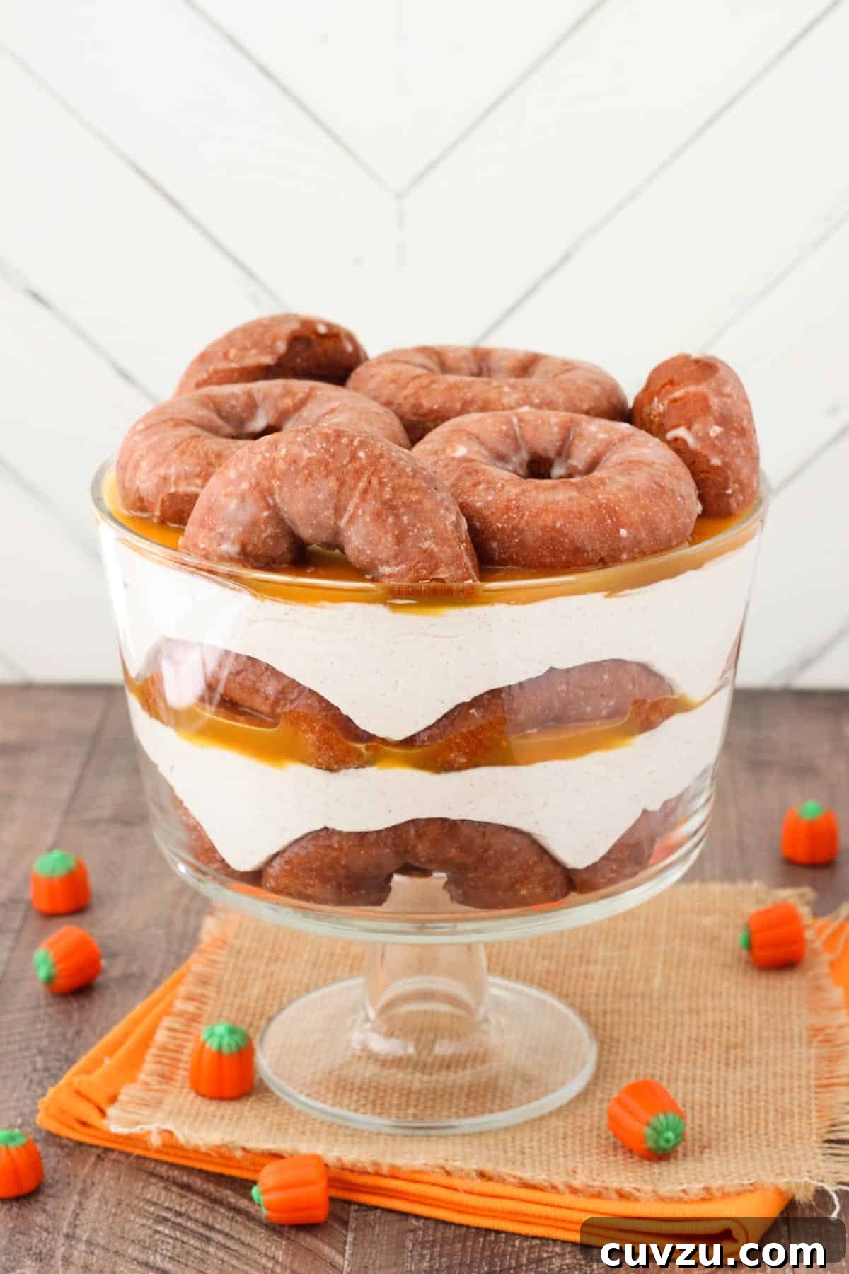 Pumpkin Spice Donut Cheesecake Dream 4 Side view of a tall pumpkin spice donut cheesecake trifle, showing its layered construction.