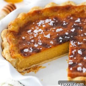 Salted honey pie with a slice missing