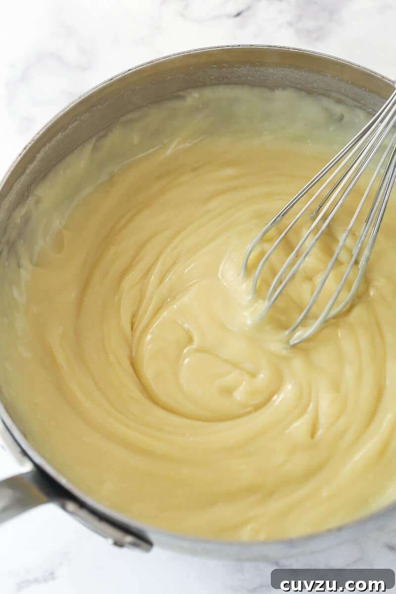 Perfectly salty and sweet, this Salted Honey Pie features a creamy custard-based filling in a classic butter pie crust. Whisking together the cream ingredients