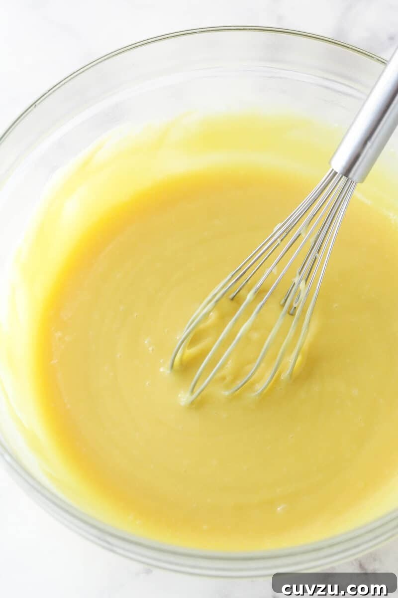 Perfectly salty and sweet, this Salted Honey Pie features a creamy custard-based filling in a classic butter pie crust. Tempering the egg yolks