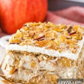 A slice of cinnamon apple icebox cake on a white plate.