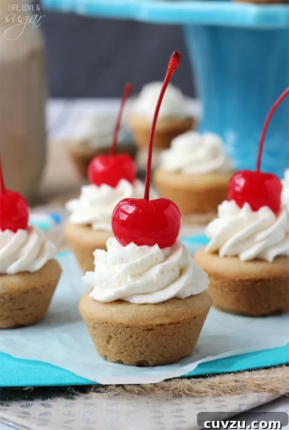 Old-Fashioned Root Beer Float Bites 6 A full batch of Root Beer Float Cookie Cups cooling on a wire rack, showcasing their consistent size and golden-brown edges.
