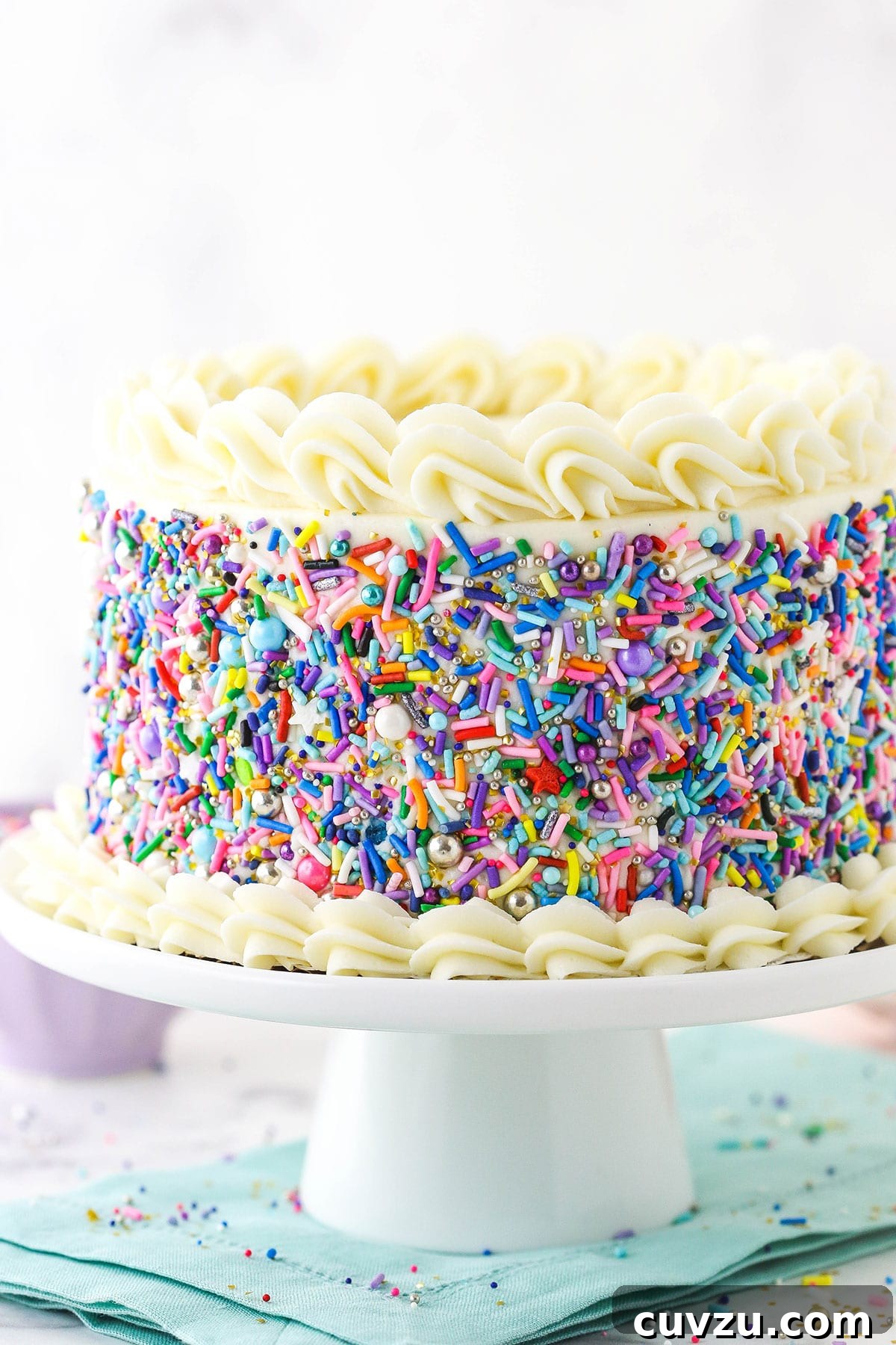 Classic 6-inch Vanilla Delight 4 6 inch vanilla cake on white cake stand