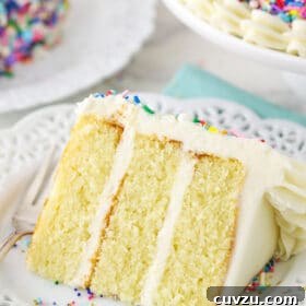 slice of 6 inch vanilla cake on white plate
