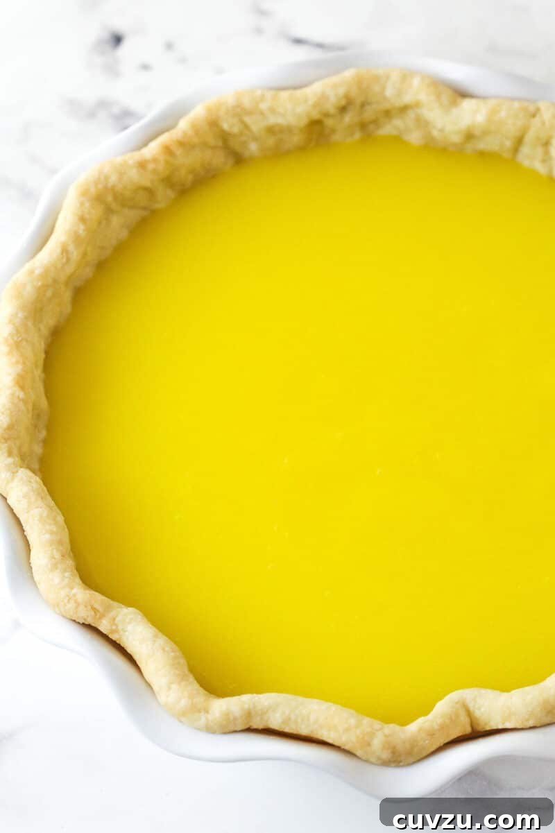 This classic lemon meringue pie features a tart lemon filling in a buttery crust topped with a light but stable meringue. Lemon filling in a pie crust