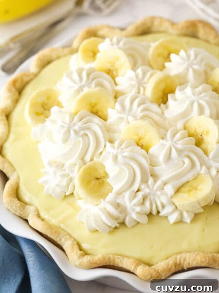 Classic Lemon Meringue Pie Recipe with Flaky Crust and Zesty Filling 10 Angled overhead view of banana cream pie