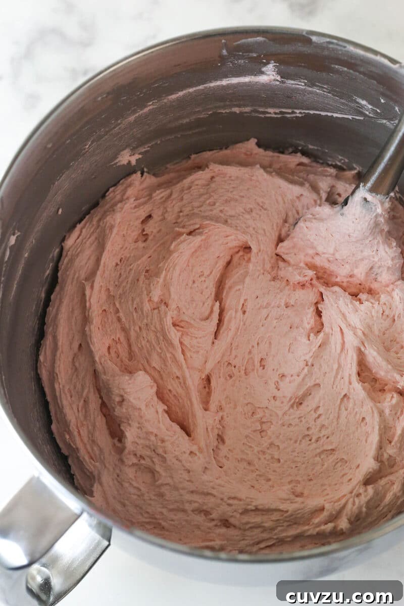 Strawberry buttercream in a mixing bowl