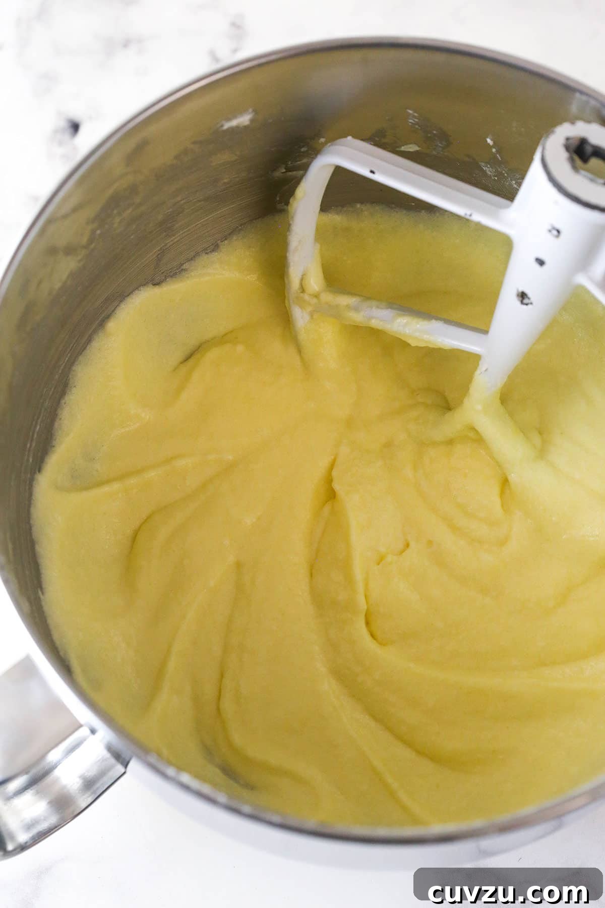 Wet cake ingredients in a mixing bowl