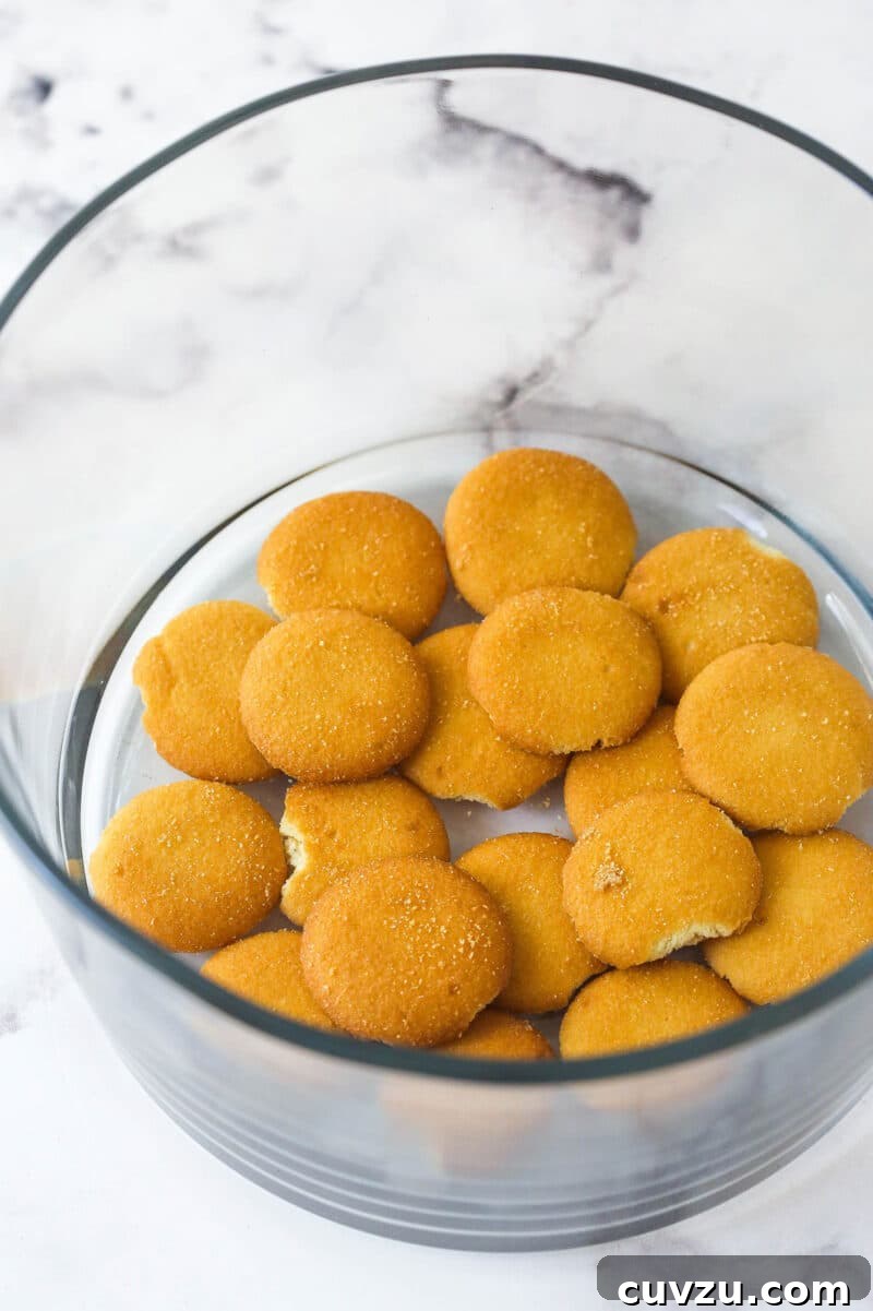Magnolia Bakery-Style Banana Pudding Recipe from Scratch 9 Nilla wafers in the bottom of a glass bowl