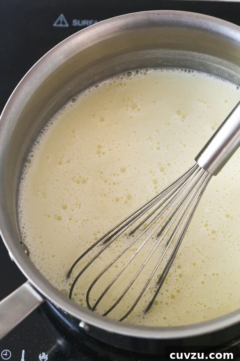 Magnolia Bakery-Style Banana Pudding Recipe from Scratch 4 Heating milk and sweetened condensed milk