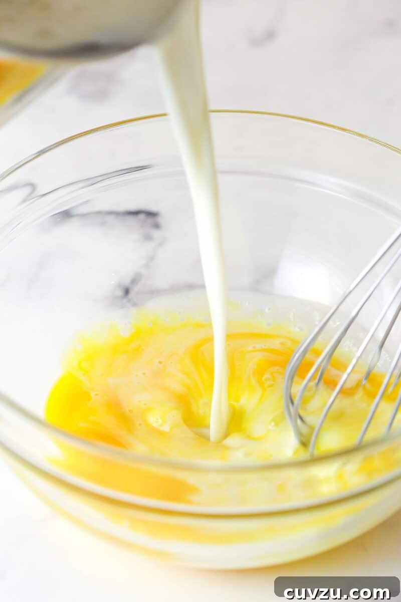 Magnolia Bakery-Style Banana Pudding Recipe from Scratch 5 Tempering egg yolks